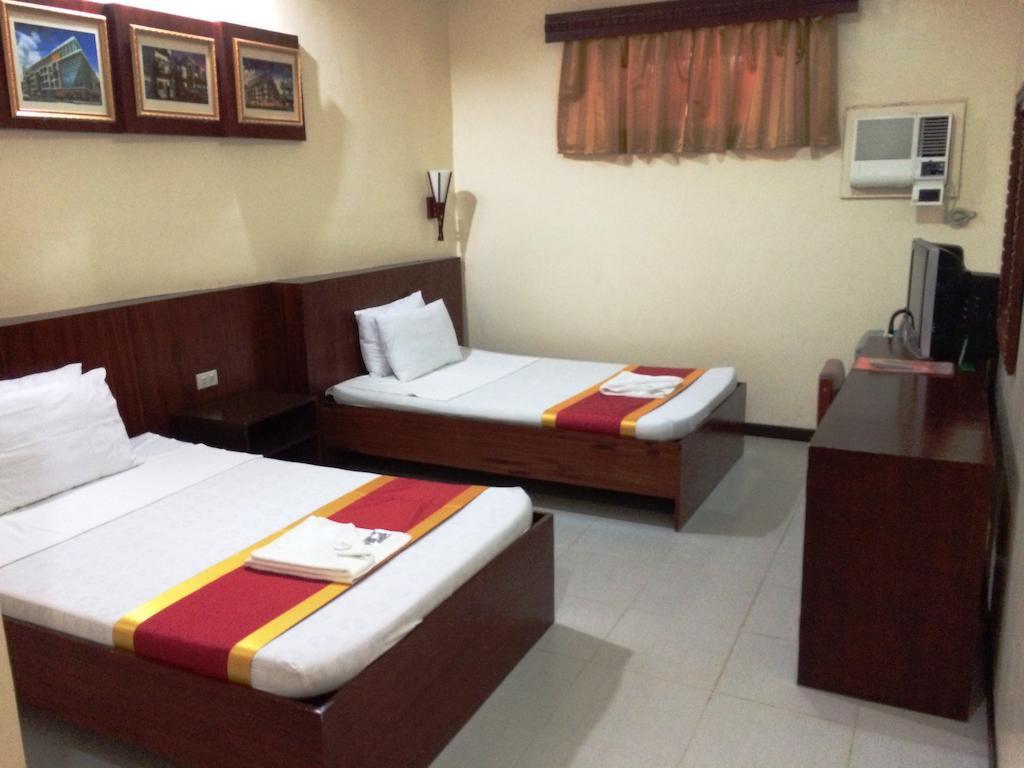 Ysabelle Mansion Bed and Breakfast Puerto Princesa Kamer foto