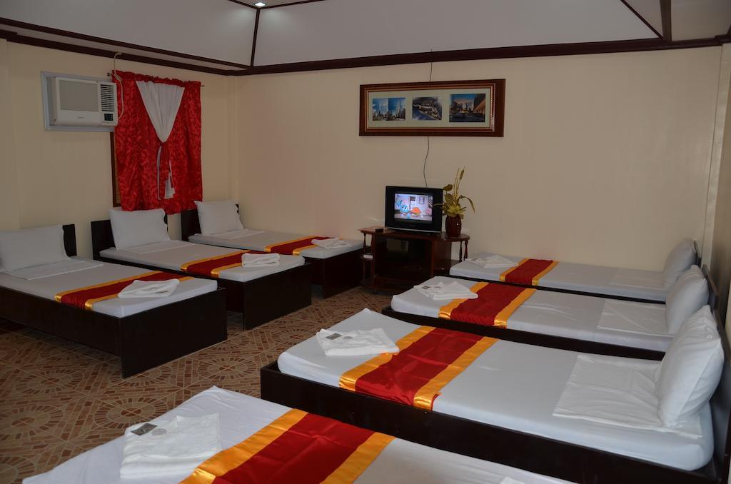 Ysabelle Mansion Bed and Breakfast Puerto Princesa Kamer foto