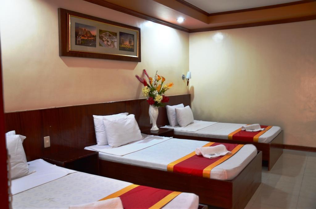 Ysabelle Mansion Bed and Breakfast Puerto Princesa Kamer foto