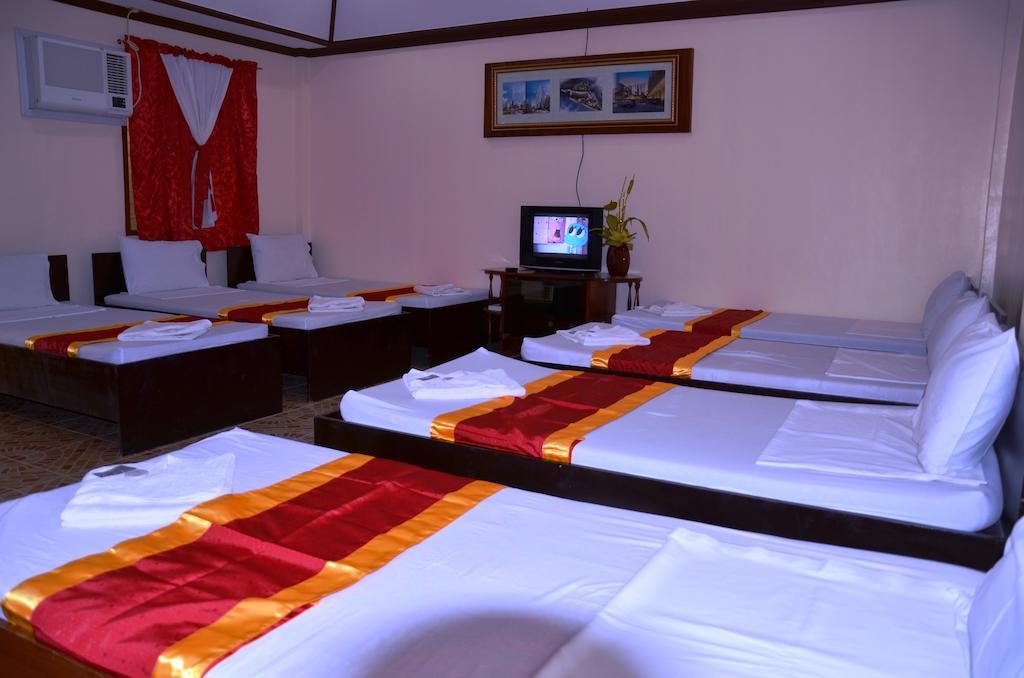 Ysabelle Mansion Bed and Breakfast Puerto Princesa Kamer foto
