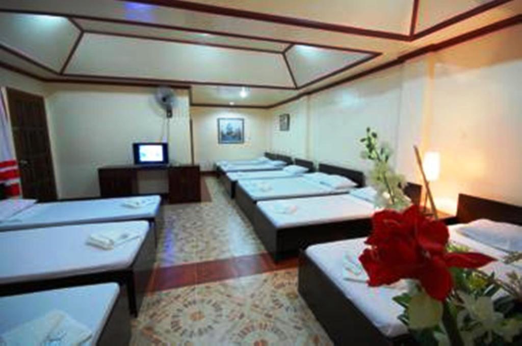 Ysabelle Mansion Bed and Breakfast Puerto Princesa Kamer foto